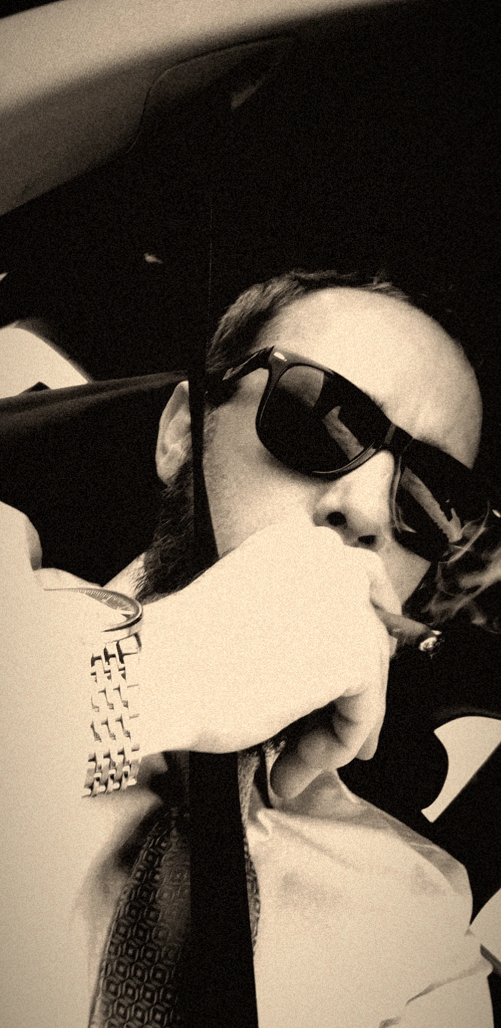 Props in black and white, cigar in hand